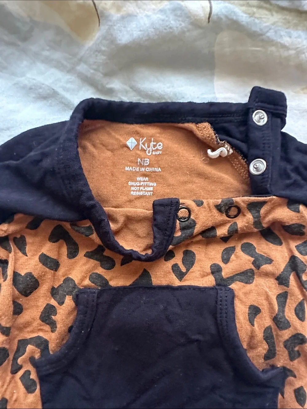 Kyte BABY Brown Leopard Print One-Piece with Black Accents